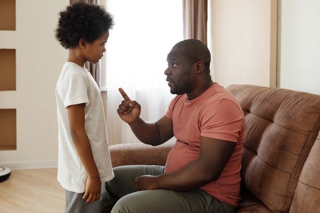 Man talking to son